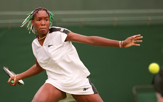 Venus Williams, her hair beaded in the Wimbledon colors, on June 28, 1997, at the Wimbledon Championships (Frank Leonhardt/AFP/Getty Images)